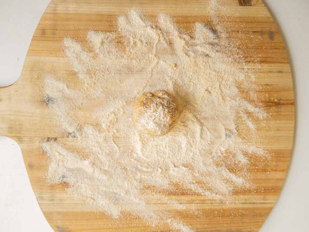 Form the sourdough tortilla dough into a ball.