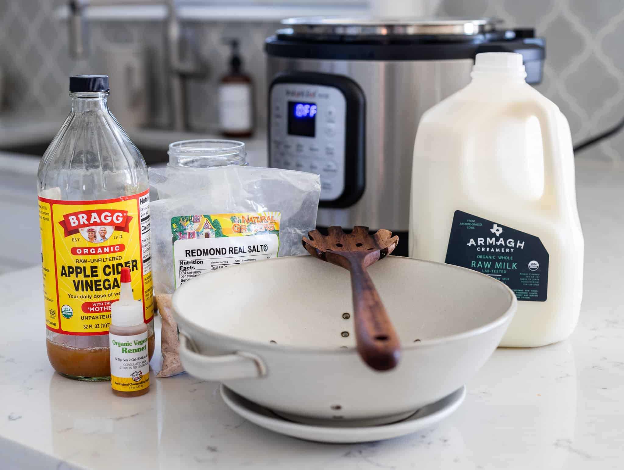 The ingredients and equipment you will need to make homemade mozzarella cheese in the instant pot.