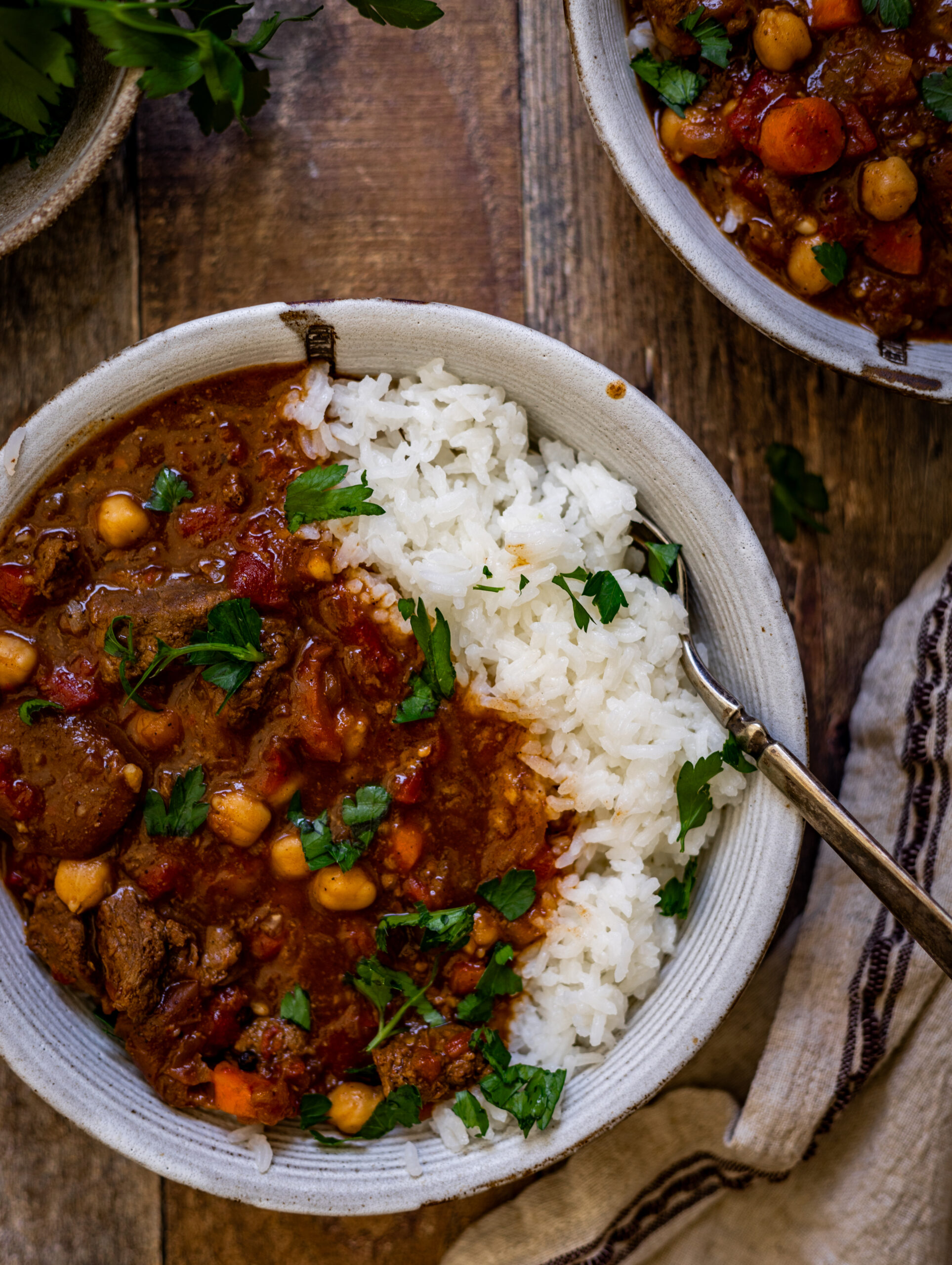Moroccan lamb stew filled with chickpeas, tender lamb, diced tomatoes, and dried apricots.