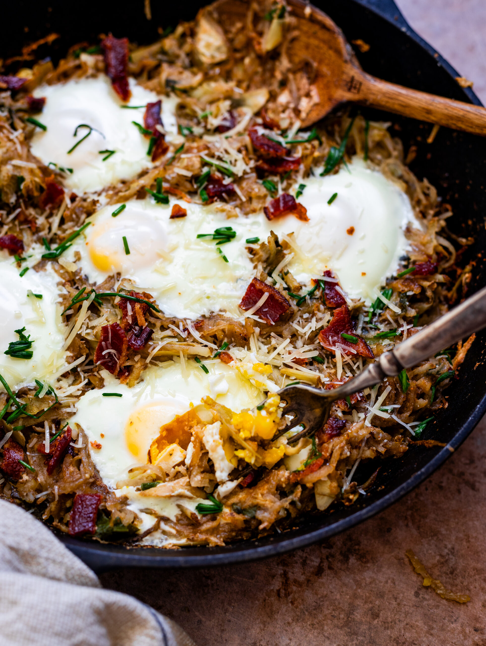cheesy potato hashbrowns with bacon and eggs