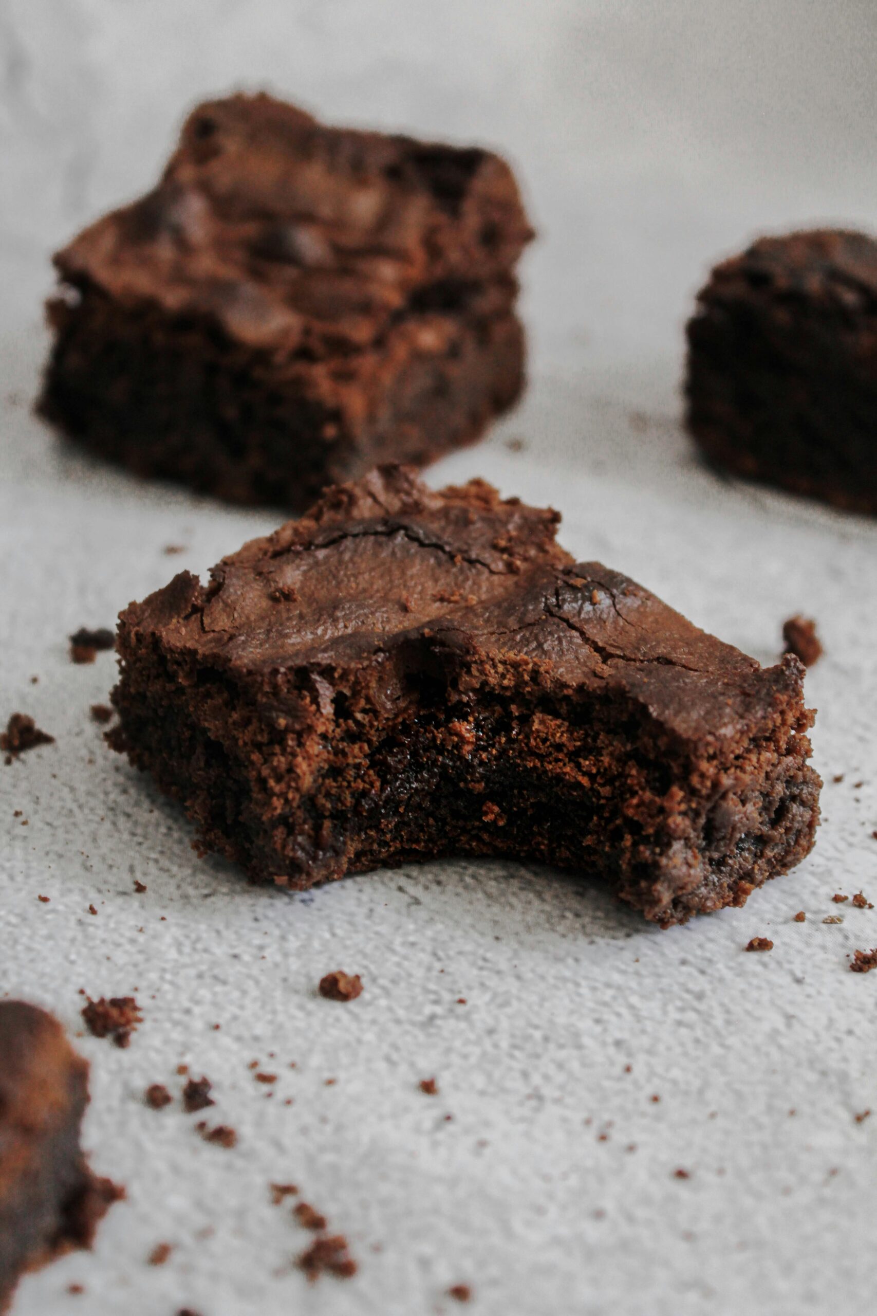 Sourdough brownies with a bite in them that make an easy sourdough discard dessert