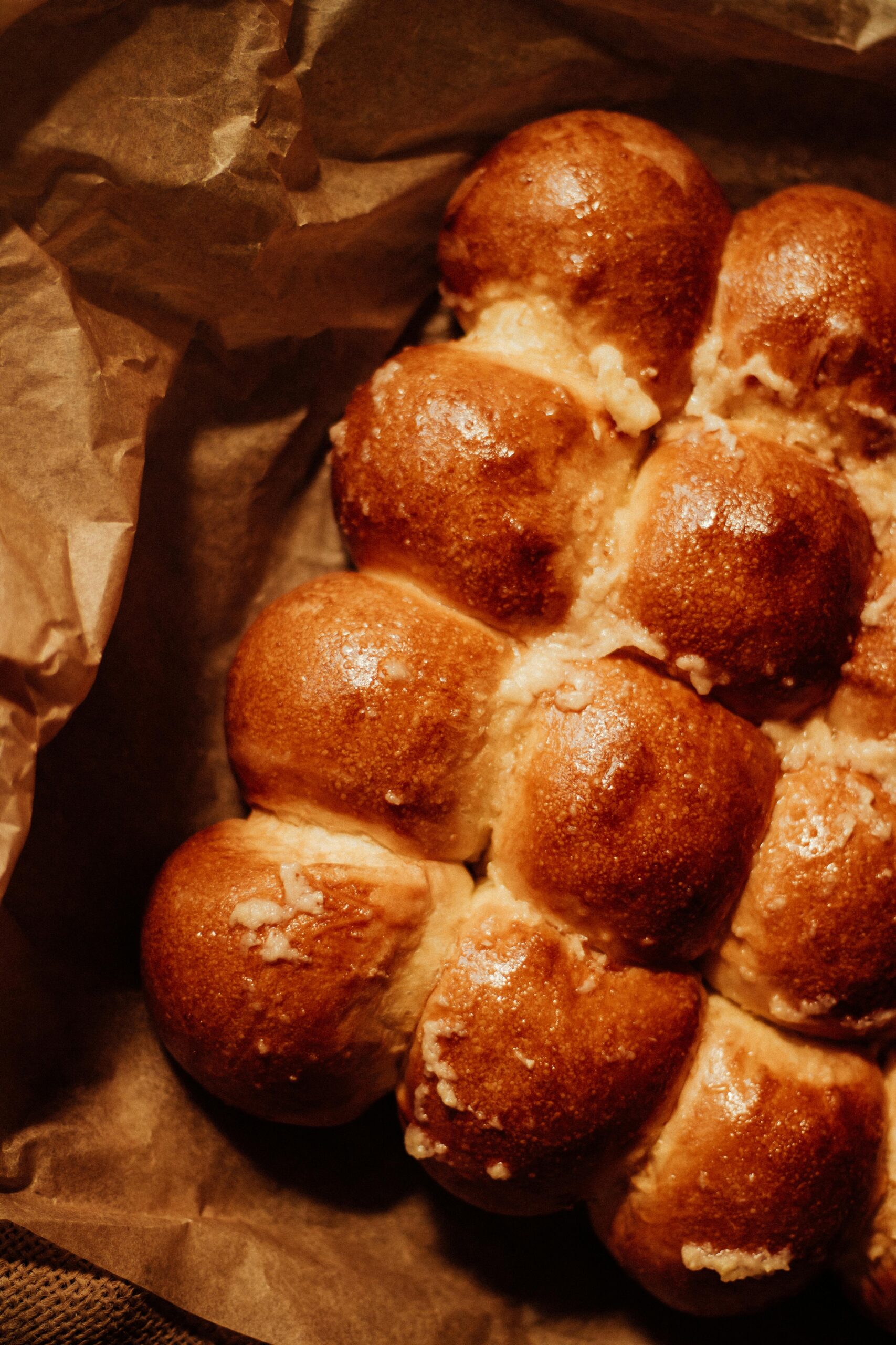 a pan of fresh milled flour dinner rolls which are whole wheat dinner rolls
