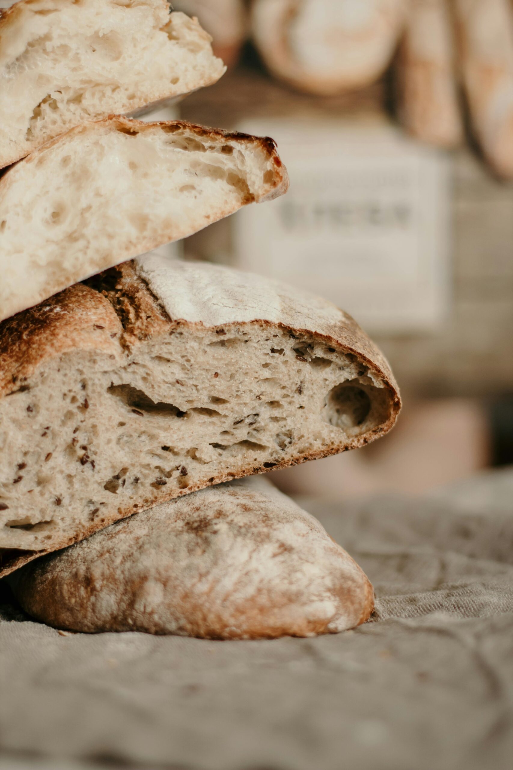 a stack of dutch oven sourdough bread, a rustic sourdough bread recipe