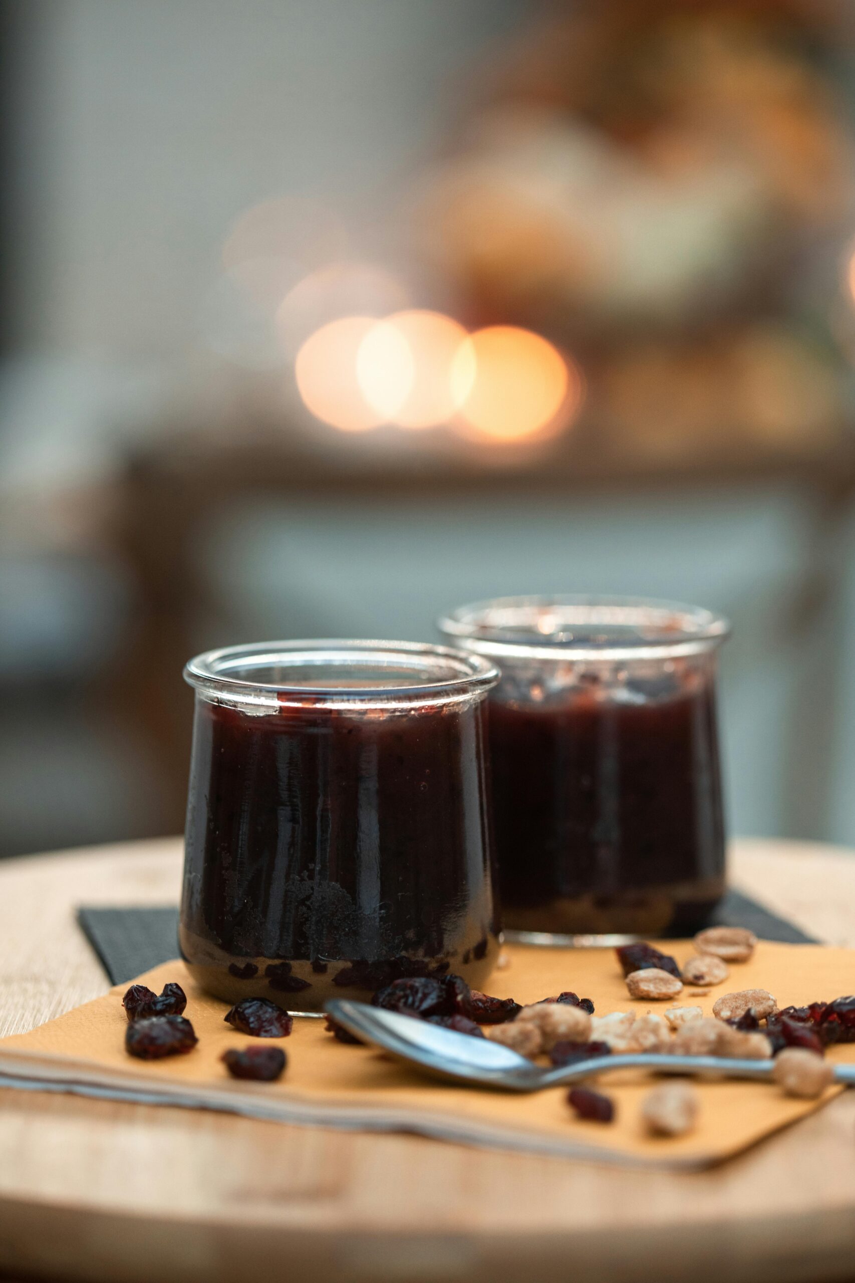 Jars of homemade elderberry syrup for a recipe on how to make elderberry syrup