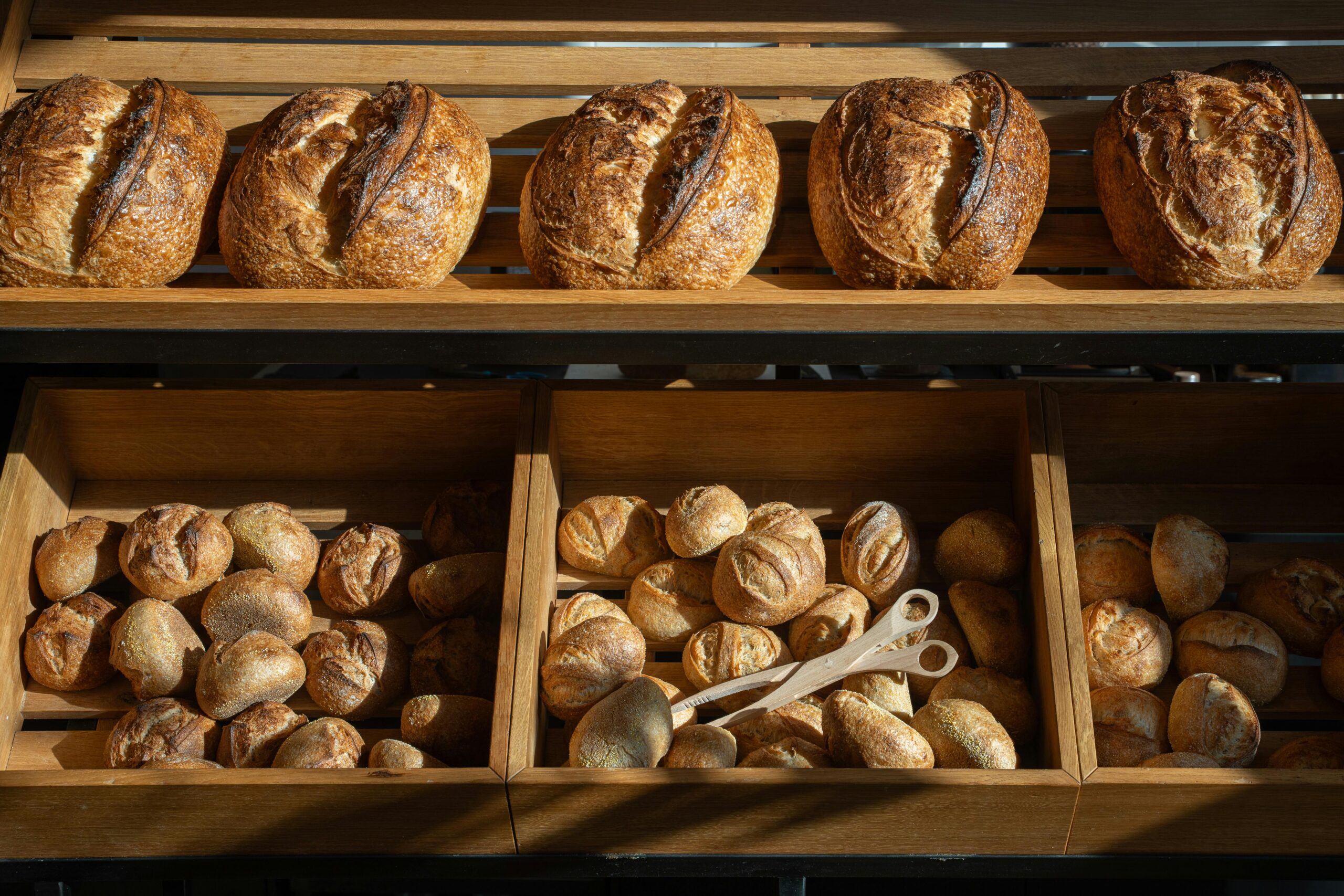 Loaves of sourdough bread to sell showing selling bread from home legally and how to sell sourdough bread.