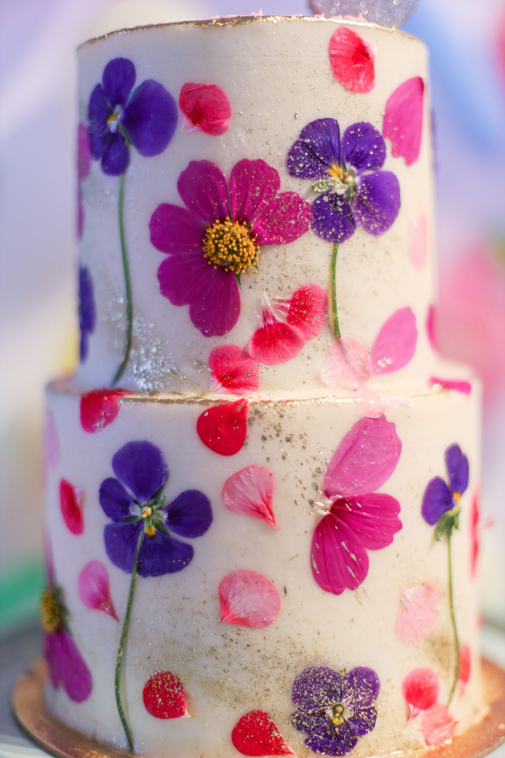 Dried flowers on a cake showing how to dry flowers and DIY pressed flowers