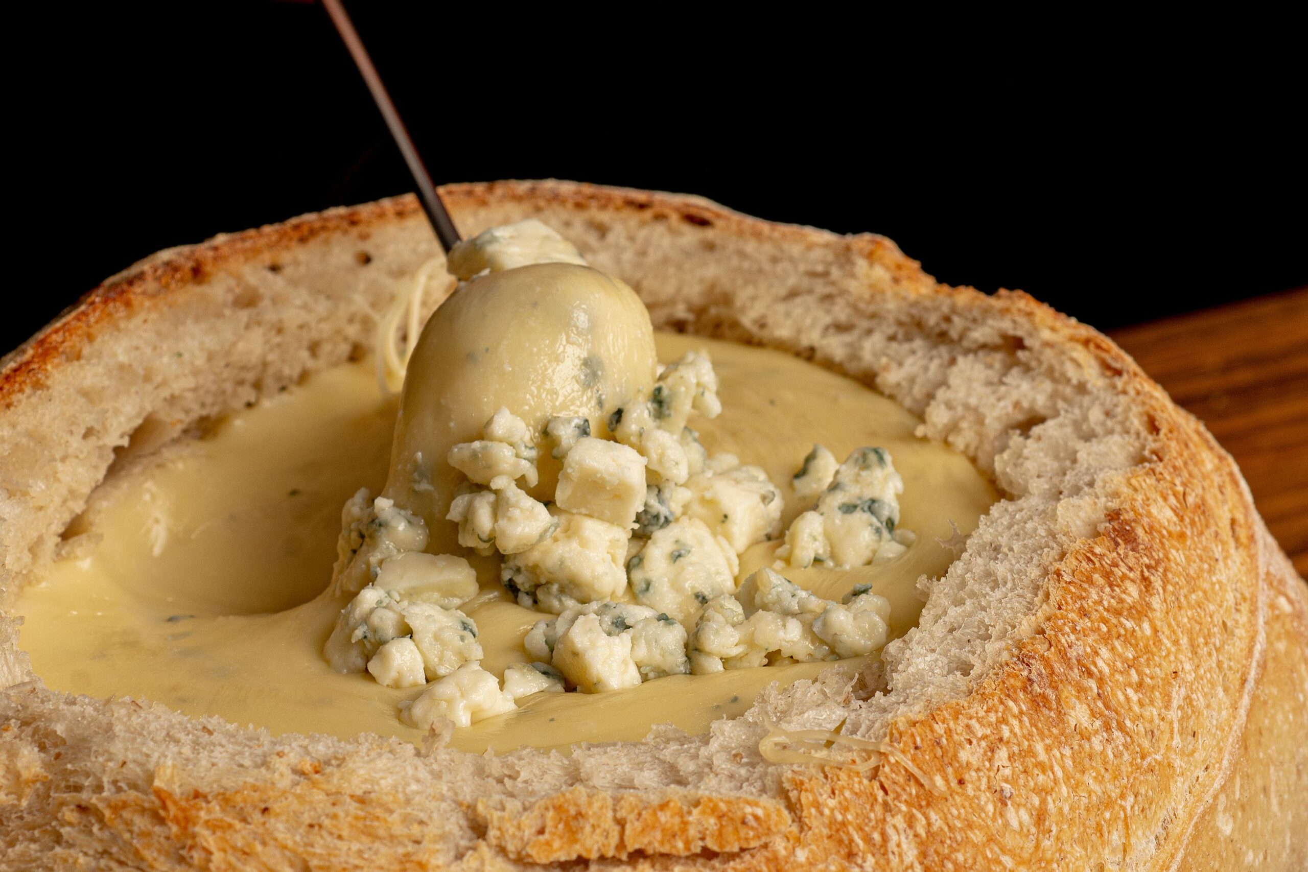 A sourdough bread bowl showing how to make a sourdough bread bowl