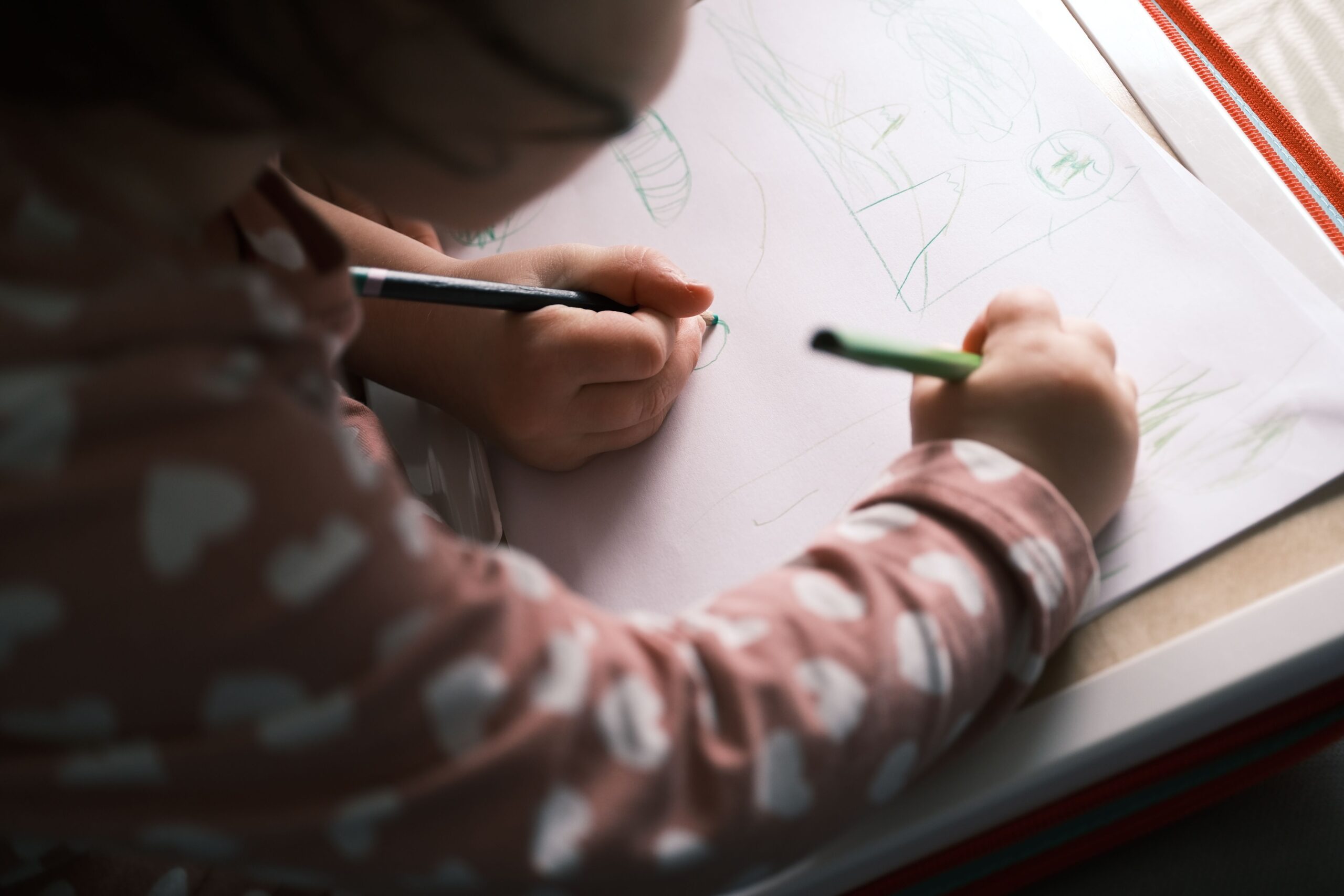 A student completing homeschooling curriculum showing why we choose Ambleside online